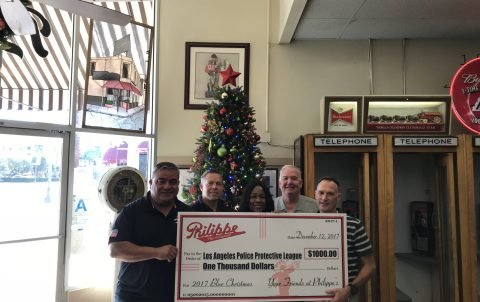 Philippe's Donates $1k to LAPPL's Blue Christmas